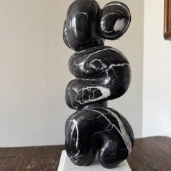 Abbracci Veined Black Marble Sculpture on White Base by Piero Speranza
