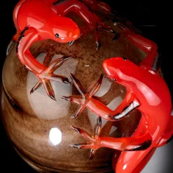 Brown Glass Egg with 2 Red Geckos