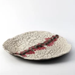 Grande Luna In Rosso Decorative Plate by Nino Basso