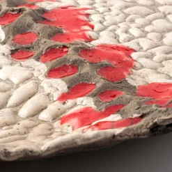 Grande Luna In Rosso Decorative Plate by Nino Basso