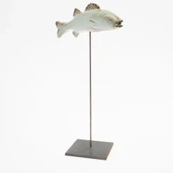 Slim white seabass sculpture