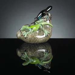 Two Glass Green Lizards on Stone