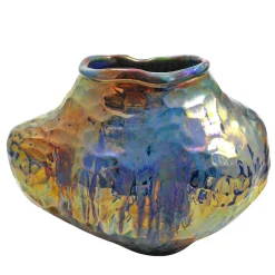 Vase with Multi-Faceted Reflections of Light